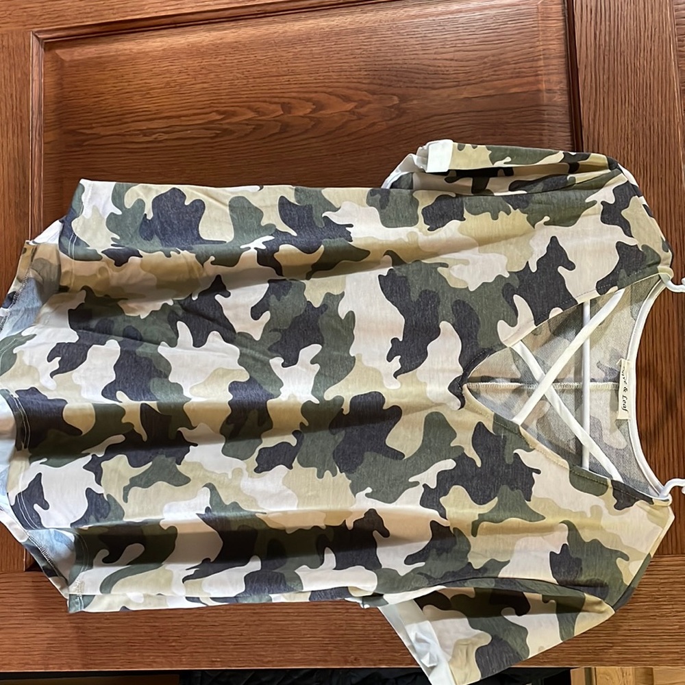 New without tags still in the bag, super cute summer shirt in camo
